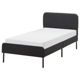 Modern black bed with sleek headboard and metal legs.