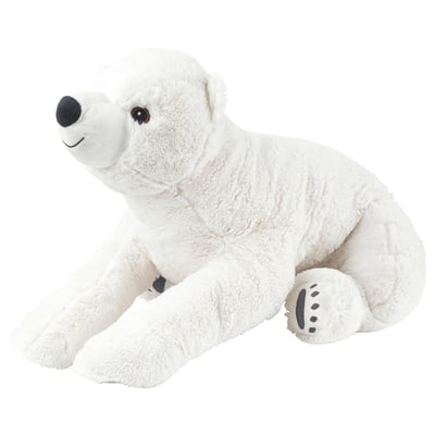 A plush white polar bear toy with black eyes and nose, sitting on all fours.
