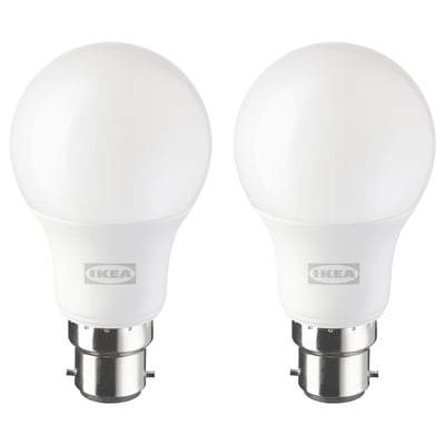 Two ikea led light bulbs, white, round shape with frosted finish, silver base, for energy-efficient and warm white light.