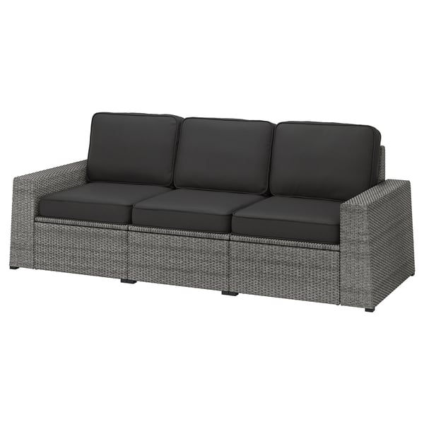 A modern, grey outdoor sofa named SOLLERÖN with dark cushions, made from durable plastic rattan and steel frame.