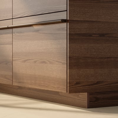 Dark brown wooden kitchen cabinet with long metallic handle.