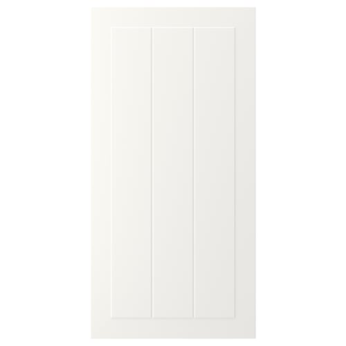 A white STENSUND cabinet door with a smooth, rectangular design featuring vertical grooved panels and a framed look.