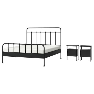 Modern black metal bed set with curved lines and bedside tables. Elegant and functional design.