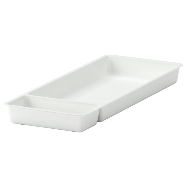 A white STÖDJA drawer organizer. Its made of polypropylene plastic and has a rectangular shape with two compartments.