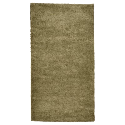 Displays a rectangular, olive green STOENSE area rug with a soft, thick pile and a subtle sheen, perfect for cozy, sound-dampened spaces.