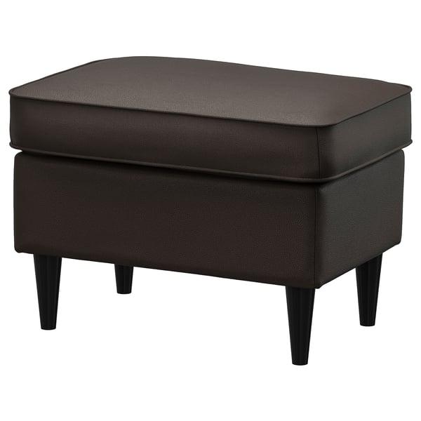 Dark grey leather-like footstool with tapered legs.