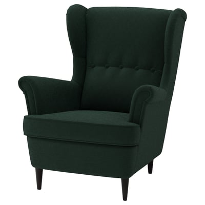 Green wingback armchair, high back, plush fabric, wooden legs.