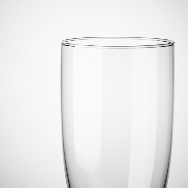 Clear, tall, slender glass, beautifully designed, perfect for champagne.