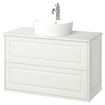 A white TÄNNFORSEN bathroom vanity in classic design with two drawers, a marble countertop, and a round ceramic basin.
