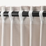 Curtains with tonight tape and rod-pocket design for easy hanging, providing privacy and reducing glares.