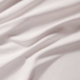 Soft, light pink fabric with elegant, wavy patterns. High-quality cotton, ideal for curtains.
