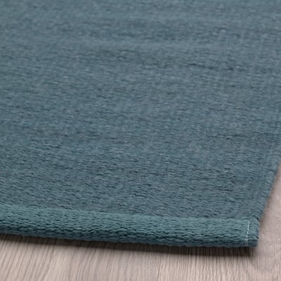 Gray-blue TIDTABELL rug, cotton-wool, flatwoven, comfy & warm, ideal for living spaces or dining tables.