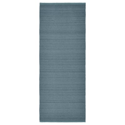 A grey-blue rectangular TIDTABELL rug with a textured, woven design. Its made with cotton and wool, ideal for cozy floors.