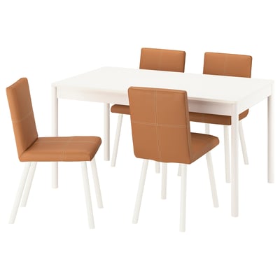 The TONSTAD set a white extendable table and four brown leather chairs with white legs, offering a modern and inviting dining setup.