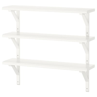 A white wooden wall shelf, TRANHULT, with three tiers. Its simple, practical for storage, and can be customized in length.