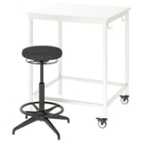 White trotten table with black lidkullen stool, sturdy design, adjustable height.