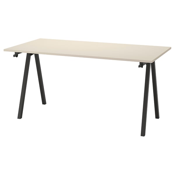 TROTTEN rectangular desk, black legs, beige top, steel and plastic, sleek minimalist design.
