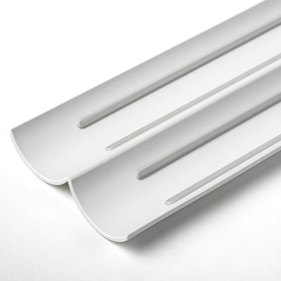 An uppadatera white plastic spice rack insert, designed to fit drawers, with three compartments and non-slip surfaces.