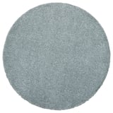 Round, light blue, shaggy rug. Made from polypropylene, soft and plush texture.
