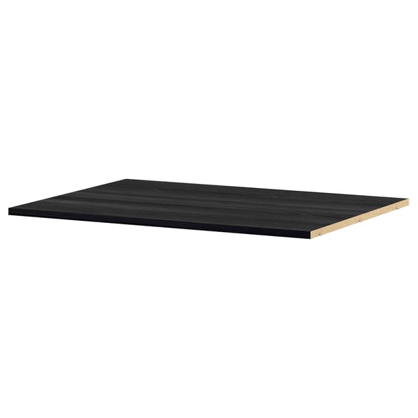 An UTRUSTA shelf in black. Its rectangular, flat, and made from melamine. Designed for corner cabinets, its durable and easy to clean.