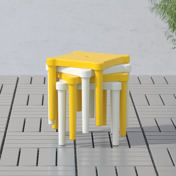 Bright yellow kids stackable stool with four legs, part of the UTTER series. Perfect for indoor/outdoor play.