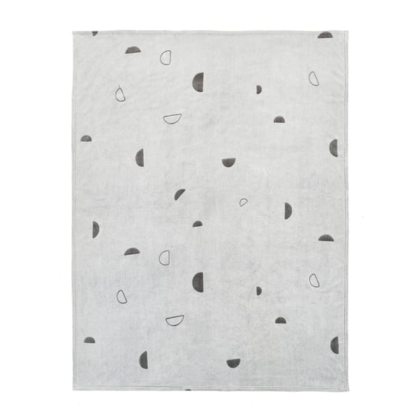 A VÄNKRETS blanket, grey in color, made of soft recycled polyester fleece, featuring a charming abstract pattern with half-circles in black.