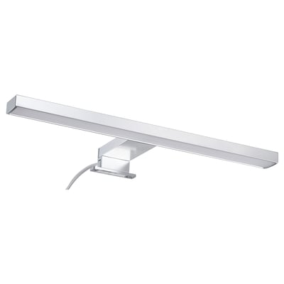 A VÅTHULT wall lamp, a sleek, silver, rectangular, modern design with led lighting ideal for bathroom use.