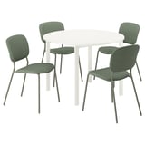 A round, white VIHALS dining table with four green chairs. The chairs have green fabric seats and backs, metal legs, and a modern, minimalist design.
