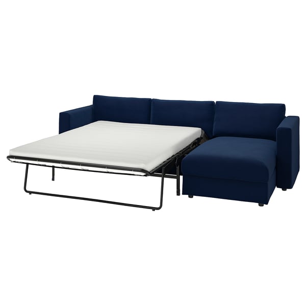 Blue VIMLE sofa-bed with sleek lines, cushioned seat, recycled materials.