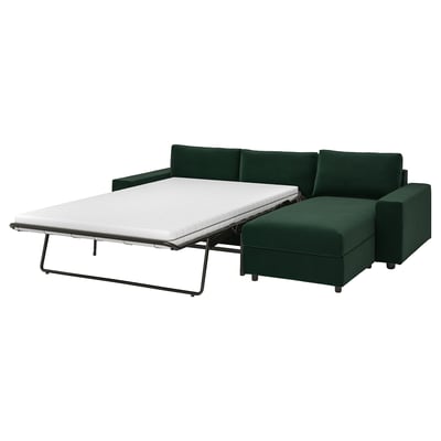 VIMLE green sofa-bed: modern, dark green, sectional design with a pull-out mattress, storage chaise & metal legs.