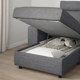 Sofa with storage: lift seat to reveal hidden items.