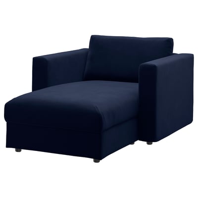 A dark blue VIMLE corner sofa chaise longue with a modern design and rectangular cushions, made of recycled and natural materials.