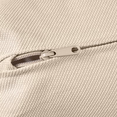 Close-up of a zipper on a beige VIMLE sofa, showcasing quality fabric and durable zipper design.