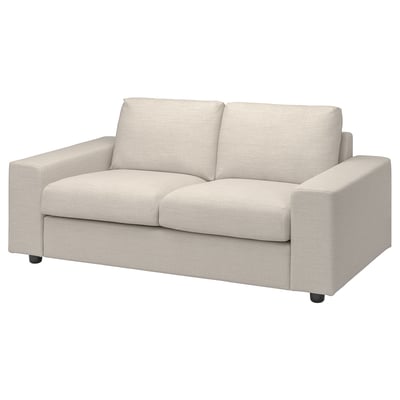 Explore the VIMLE sofa in soft beige, featuring a minimalist design with plush cushions and durable recycled fabric.