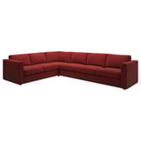 A VIMLE l-shaped red sofa with a soft, reflective velvet finish.