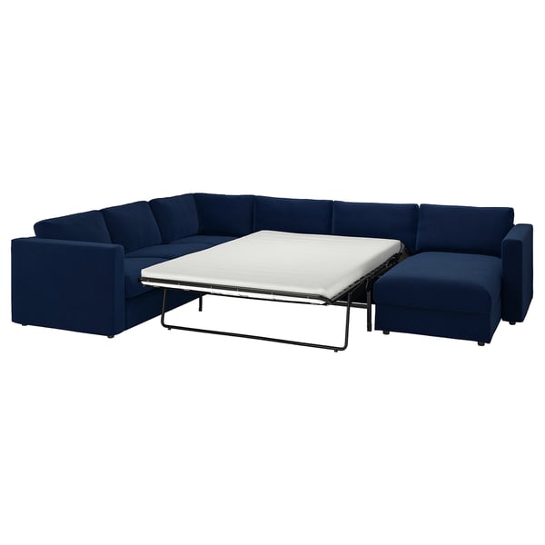VIMLE navy blue sectional sofa-bed, modern design with clean lines, convertible for sleeping.