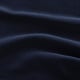 Dark blue, smooth fabric with slight sheen, curved folds.