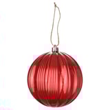 Bright red glossy christmas ornament, round with groove design, hangs from natural jute string.