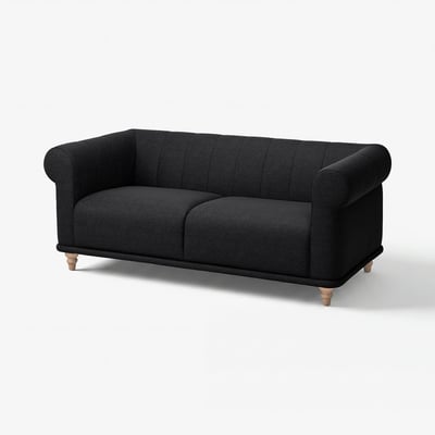 Image depicts a black VISKAFORS 2-seat sofa. It round, inviting shapes, deep soft seats, and classic design with soft armrests.