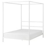 White four-poster bed with modern metallic design, ideal for creating a cozy sleeping nook.
