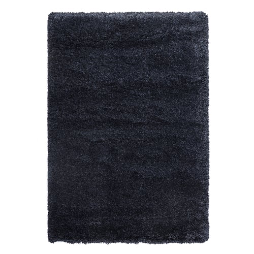 Dark blue plush rug, soft & inviting.