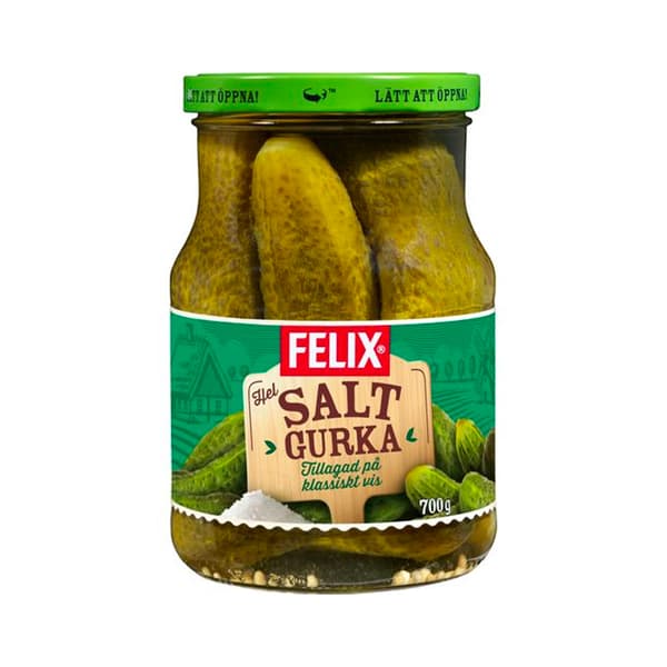 צנצנת מלפפונים עם בצל וחרדל במי מלח