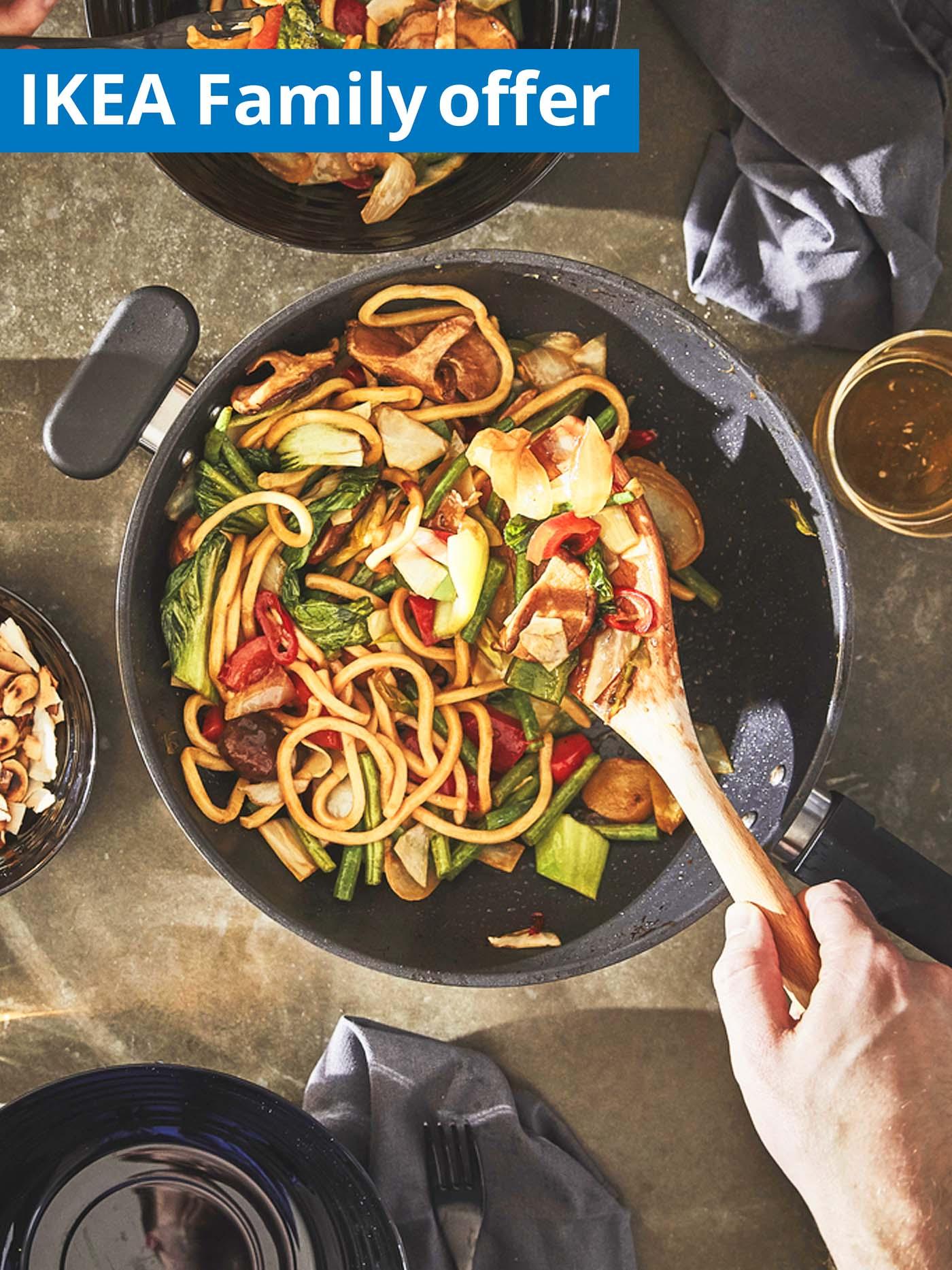 1 - 31 July IKEA Family offer. Cookware, MIDDAGSMAT wok, 28 cm, non-stick and stainless steel.