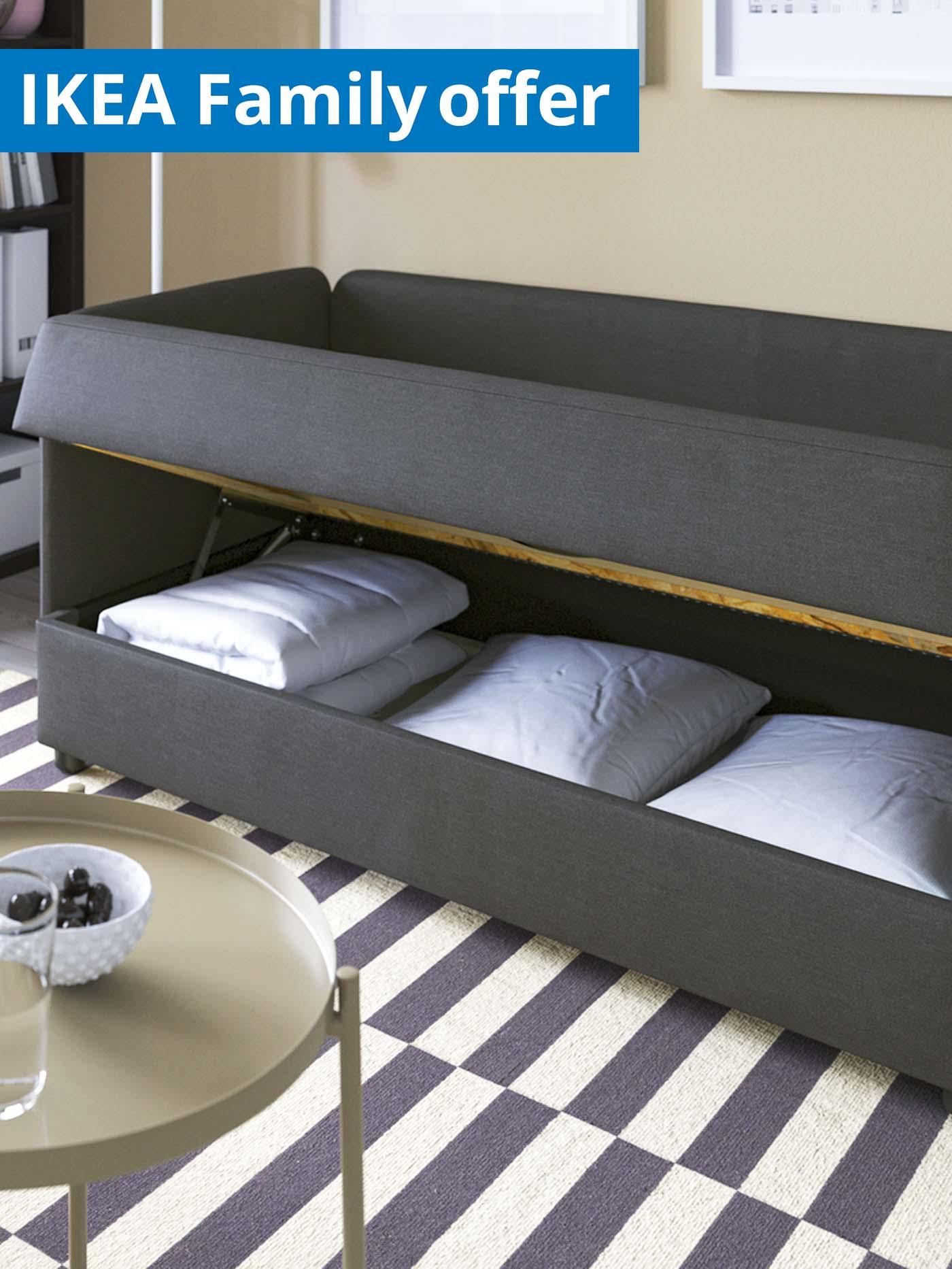 1 - 31 July IKEA Family offer. LINDÅKRA sofa-bed in Vissle dark grey in living room.