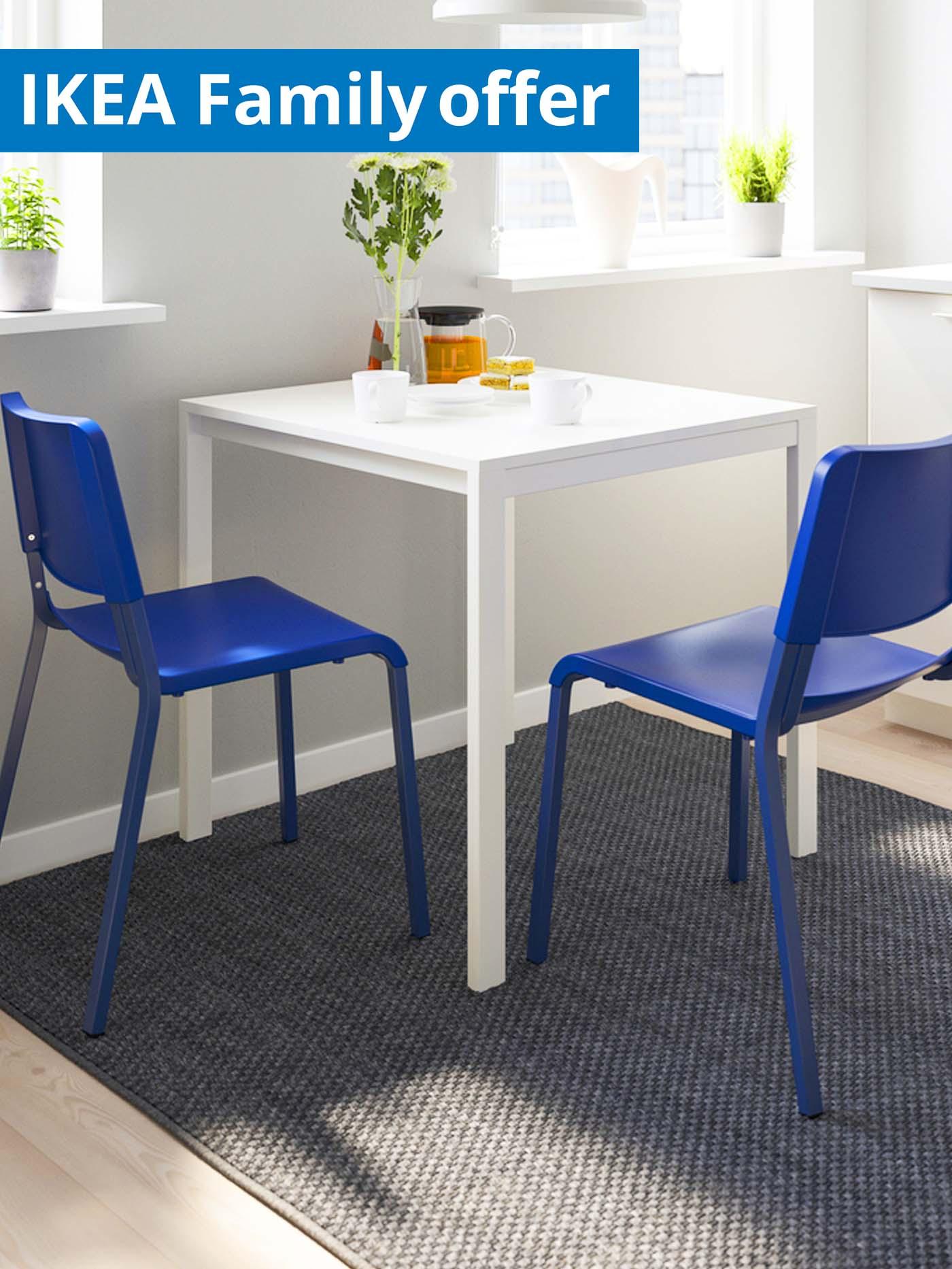 1 - 31 July IKEA Family offer. TEODORES blue chair with white VIHALS dining table in dining room.