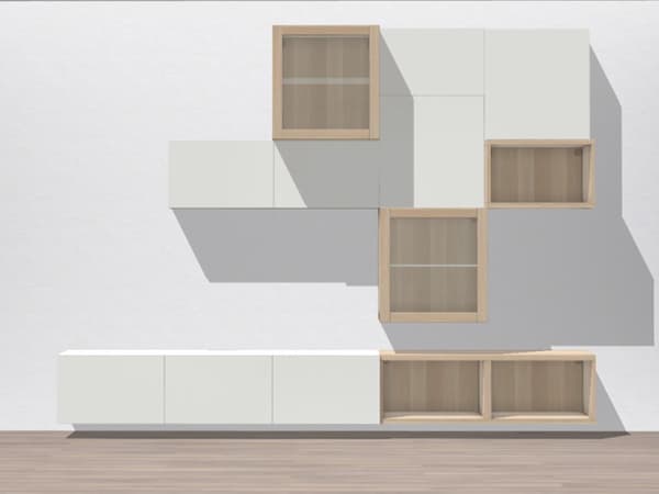 1 Besta Regal hängt an einer Wand mit 3 weißen Fronten. Darüber hängen nochmal 2 Regale mit jeweils 1 weißen Front 