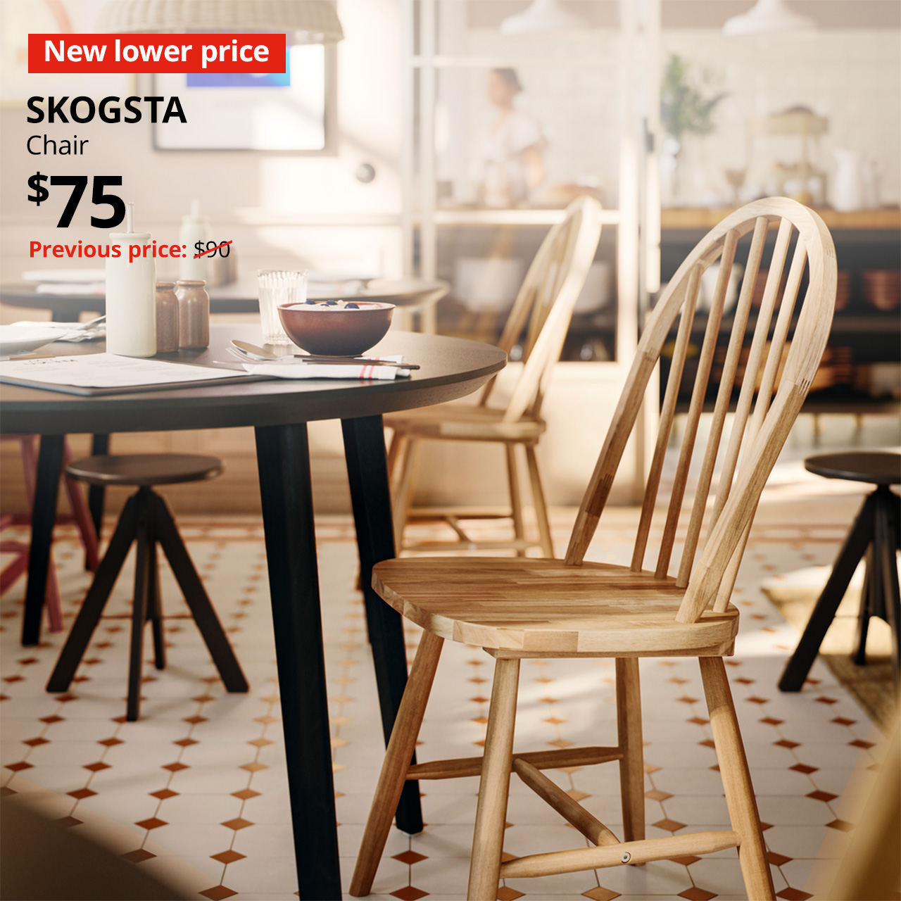 A acacia SKOGSTA chair with a black/ash veneer LISABO table. Text on image reads "New lower price, SKOGSTA, Chair, $75, Previous price $99"