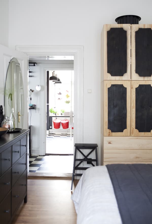 A bedroom with IKEA cabinets.