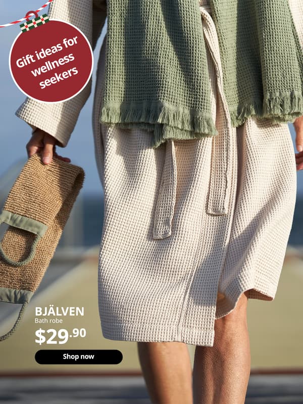 A beige BJÄLVEN bath robe