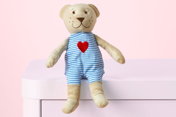 A beige FABLER BJÖRN soft toy